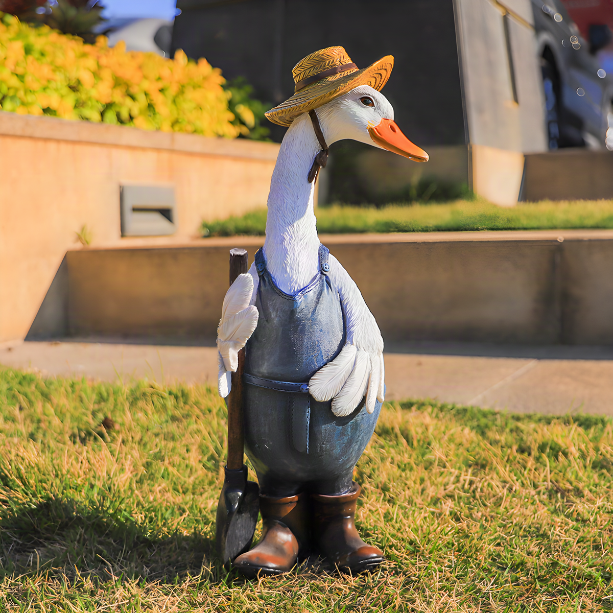 Figuras de pato jardinero de resina