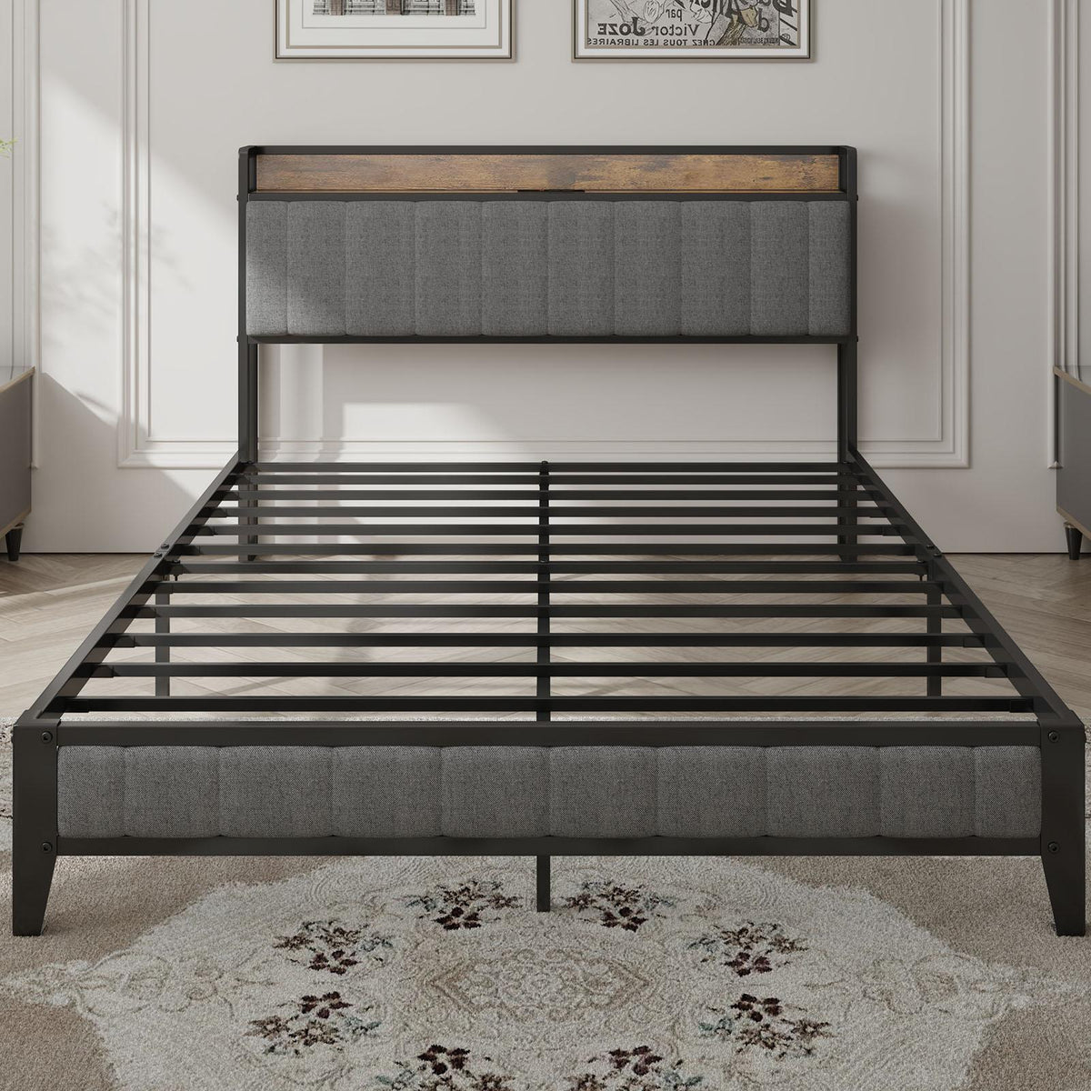 Estructura de cama matrimonial de metal con cabecera de carga.